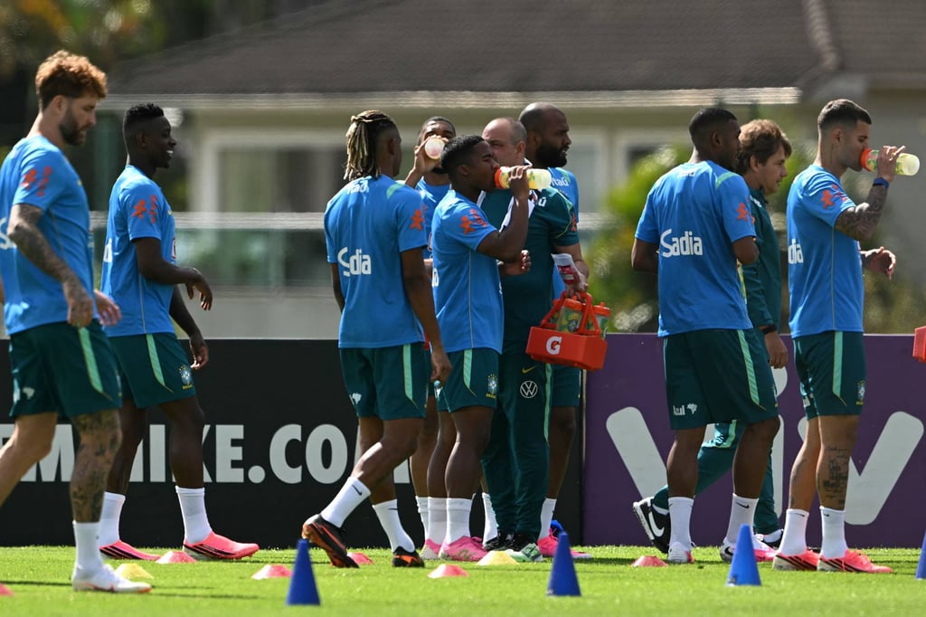 Brazil’s forward Endrick (centre) takes a water break during training. Players will get three minutes per half at the World Cup to take on water as they battle soaring temperatures. Photo: AFP