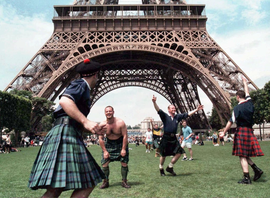Scotland fans at the Eiffel Tower in Paris during the World Cup final in France France 1998. Photo: AP