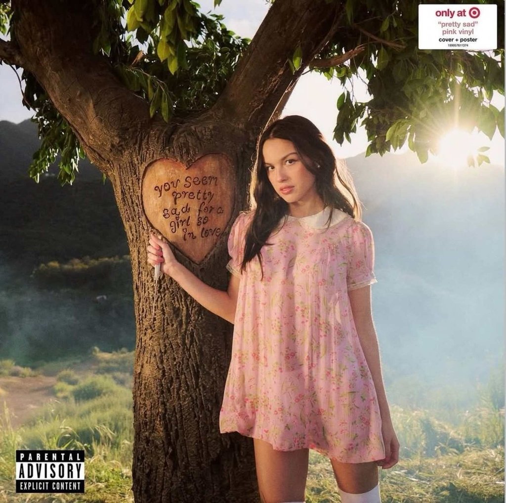 Olivia Rodrigo wears an Anna Sui babydoll dress on the cover of her new album, You Seem Pretty Sad for a Girl So in Love. Photo: @annasui/Instagram