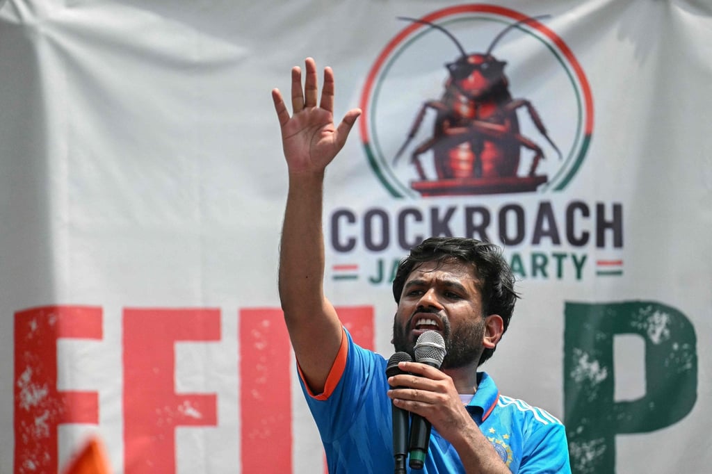 Cockroach Janta Party founder Abhijeet Dipke addresses his supporters during a protest over alleged irregularities in the country’s major examinations, in New Delhi on Saturday. Photo: AFP