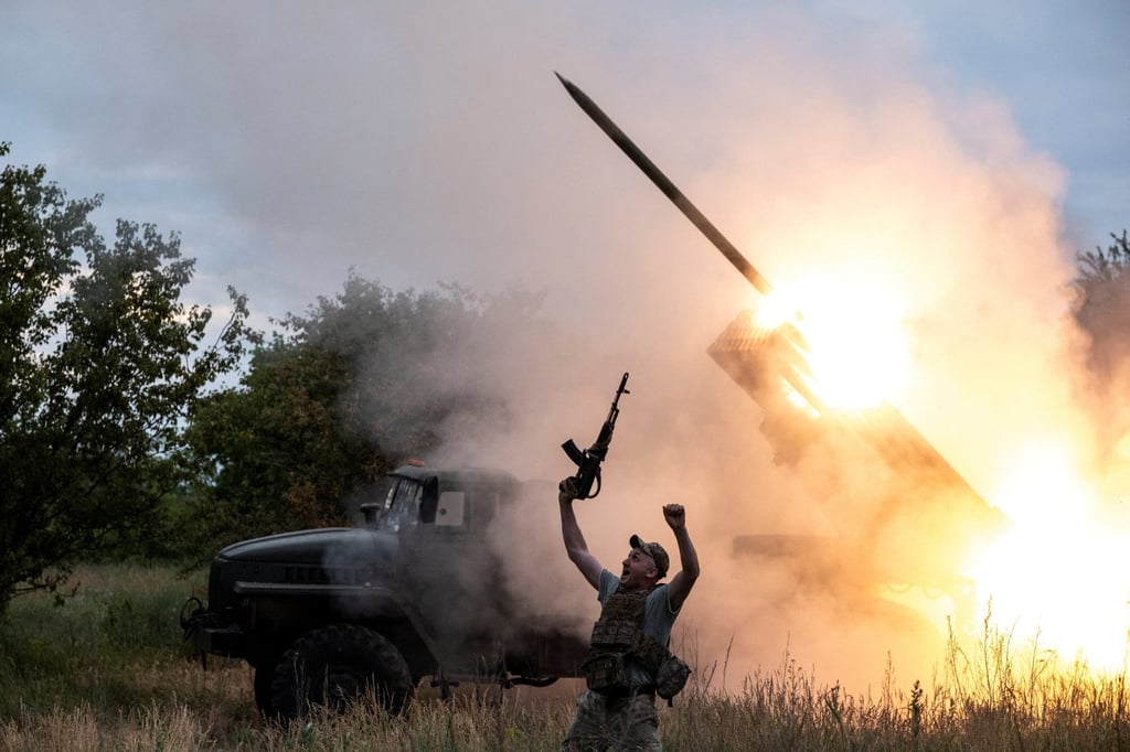 A Ukrainian serviceman reacts as his colleagues fire a BM-21 Grad multiple launch rocket system towards Russian troops on Thursday. Photo: Press Service of the 93rd Kholodnyi Yar Separate Mechanised Brigade of the Ukrainian Armed Forces via Reuters