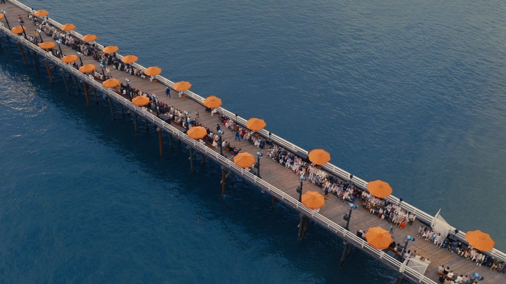 The Malibu Pier decorated with orange beach umbrellas for Zegna’s show. Photo: Handout The Malibu Pier decorated with orange beach umbrellas for Zegna’s show. Photo: Handout