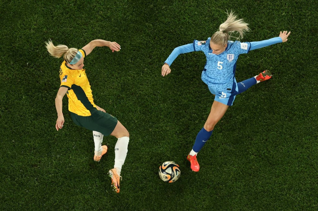 England’s Alex Greenwood (right) competes for the ball with Australia’s Ellie Carpenter during the Fifa Women’s World Cup 2023 semi-final in Sydney. Photo: AFP via Getty Images England’s Alex Greenwood (right) competes for the ball with Australia’s Ellie Carpenter during the Fifa Women’s World Cup 2023 semi-final in Sydney. Photo: AFP via Getty Images