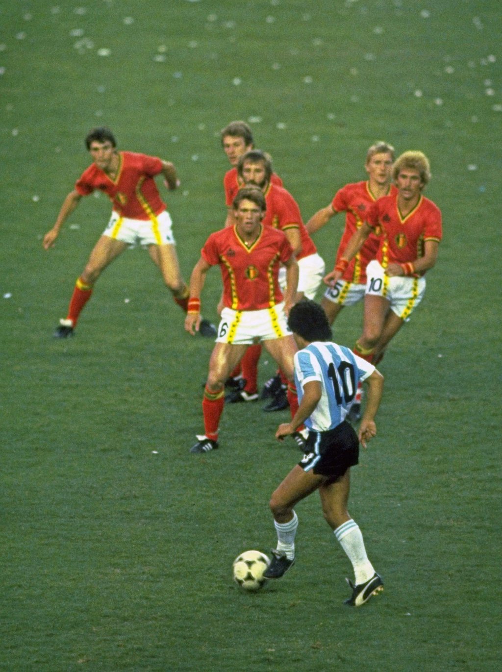 Diego Maradona of Argentina (No 10) takes on a clutch of concerned Belgium defenders at the 1982 Fifa World Cup in Spain. Photo: Allsport Diego Maradona of Argentina (No 10) takes on a clutch of concerned Belgium defenders at the 1982 Fifa World Cup in Spain. Photo: Allsport
