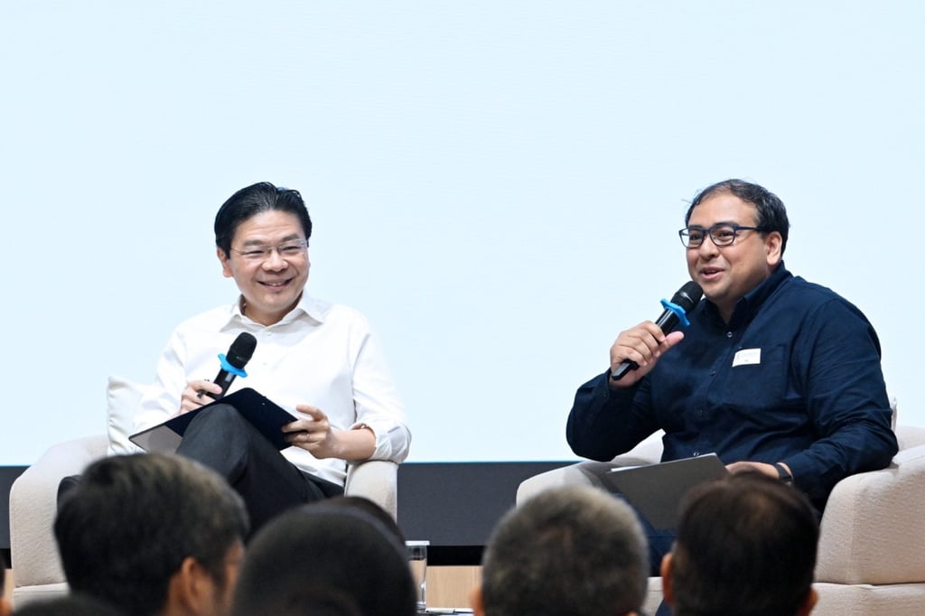 Singapore’s Prime Minister Lawrence Wong (left) and Zakir Hussain, vice-president of the Singapore Press Club, at the Singapore Press Club Eminent Speaker Series on Monday. Photo: Singapore Press Club Singapore’s Prime Minister Lawrence Wong (left) and Zakir Hussain, vice-president of the Singapore Press Club, at the Singapore Press Club Eminent Speaker Series on Monday. Photo: Singapore Press Club