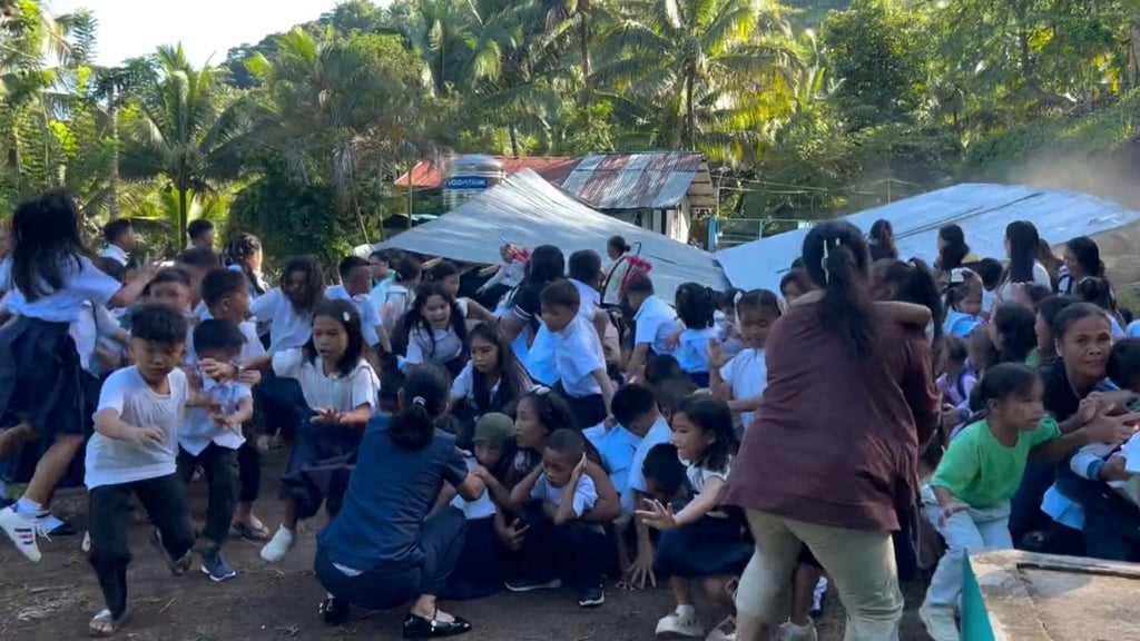 Children try to escape as the roof of a structure at Deped Mahayahay Elementary School collapses during an earthquake in Digos, Mindanao, on Monday. Photo: Deped Mahayahay Elementary School/Handout via Reuters Children try to escape as the roof of a structure at Deped Mahayahay Elementary School collapses during an earthquake in Digos, Mindanao, on Monday. Photo: Deped Mahayahay Elementary School/Handout via Reuters