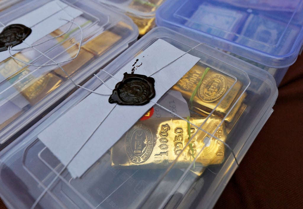 Seized gold bars are kept on display at a police station in Ahmedabad, India, in 2015. Photo: Reuters Seized gold bars are kept on display at a police station in Ahmedabad, India, in 2015. Photo: Reuters