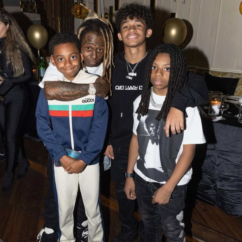 Lil Wayne with three of his kids, including Lil Novi, in 2023. Photo: @liltunechi/Instagram