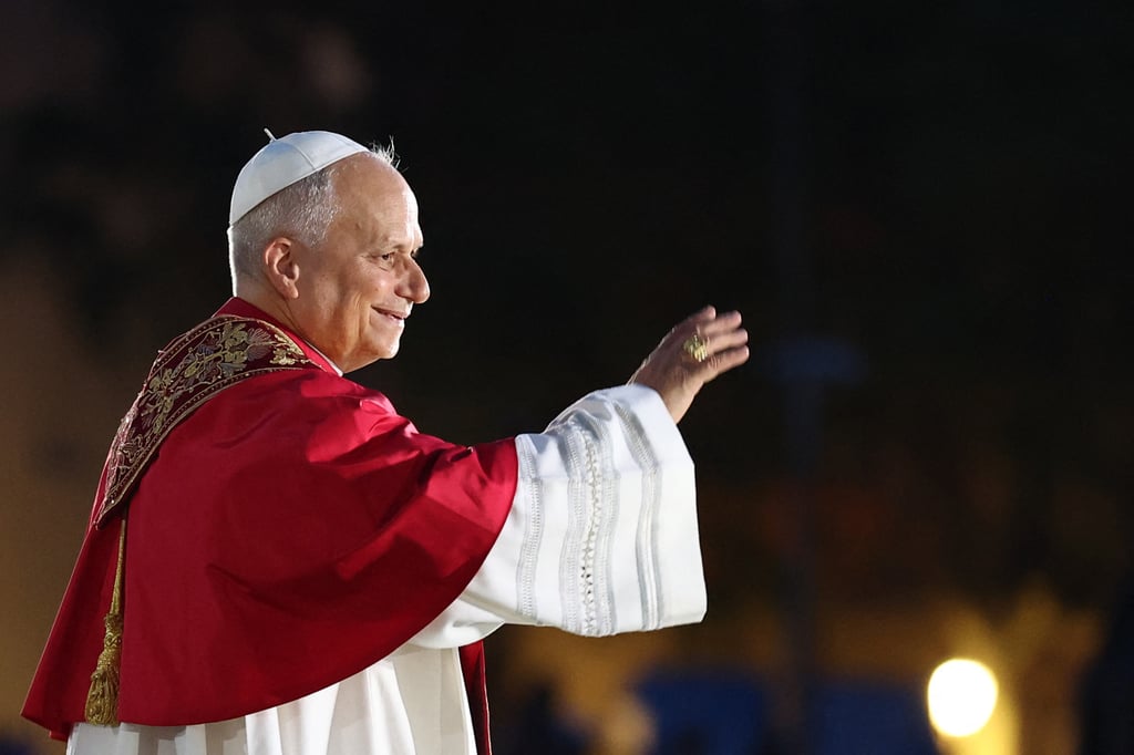 Pope Leo waves to people before inaugurating the Jesus Christ tower of the Sagrada Familia Basilica in Barcelona on Wednesday. Photo: AFP