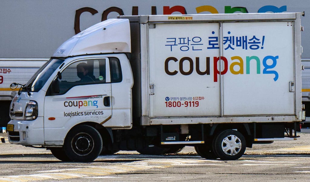 A worker drives a delivery truck of South Korean e-commerce giant Coupang in Seoul. Photo: AFP A worker drives a delivery truck of South Korean e-commerce giant Coupang in Seoul. Photo: AFP