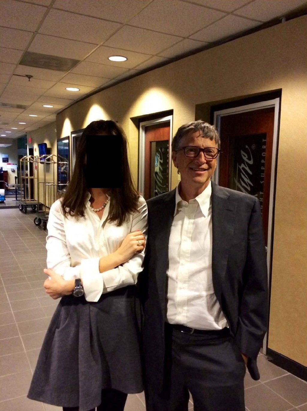 Bill Gates appears with a woman, whose identity has been obscured, in an image from the Epstein estate released by House Oversight Committee Democrats in December. Photo: House Oversight Committee Democrats via Reuters