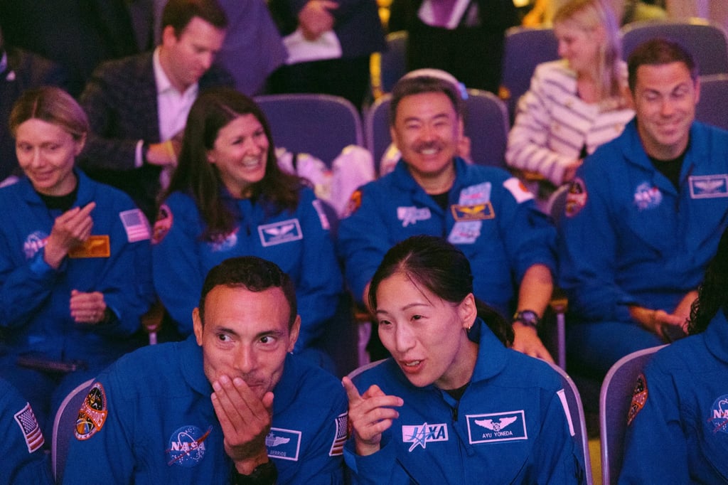 Nasa astronaut Marcos Berrios and JAXA astronaut Ayu Yoneda watch the unveiling of the Artemis III mission in Houston, Texas, on Tuesday. Photo: Reuters Nasa astronaut Marcos Berrios and JAXA astronaut Ayu Yoneda watch the unveiling of the Artemis III mission in Houston, Texas, on Tuesday. Photo: Reuters