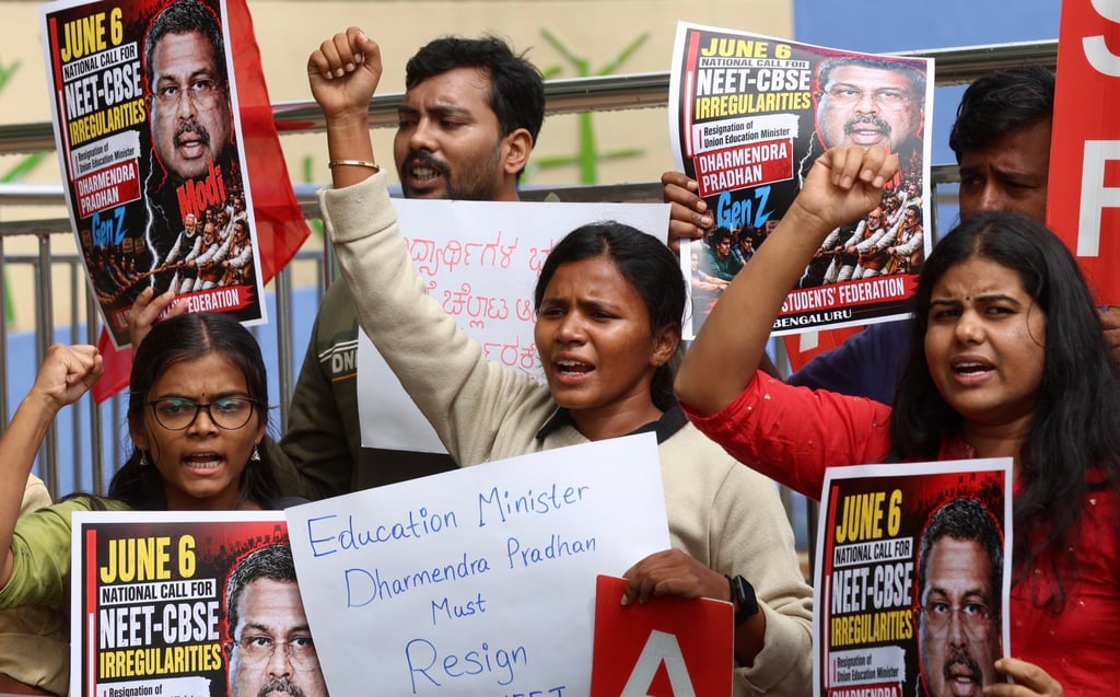 Members of the All India Students Federation hold placards and shout slogans during a protest against the alleged National Eligibility cum Entrance Test paper leak in Bangalore on Sunday. Photo: EPA Members of the All India Students Federation hold placards and shout slogans during a protest against the alleged National Eligibility cum Entrance Test paper leak in Bangalore on Sunday. Photo: EPA