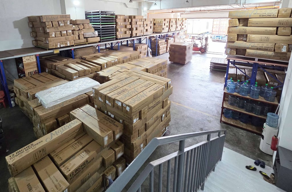 Some of the China-made mattresses falsely declared as Singapore goods are seen in a warehouse. Photo: Singapore Customs Some of the China-made mattresses falsely declared as Singapore goods are seen in a warehouse. Photo: Singapore Customs