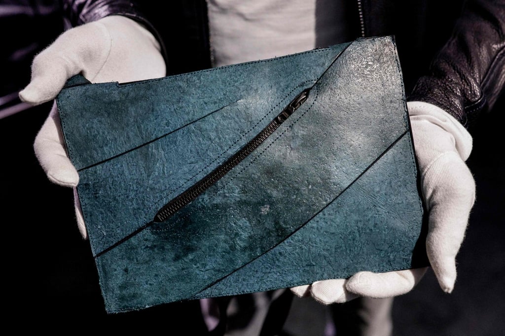 The “T. rex leather” bag is displayed on Tuesday ahead of its auction in Paris. Photo: AFP The “T. rex leather” bag is displayed on Tuesday ahead of its auction in Paris. Photo: AFP