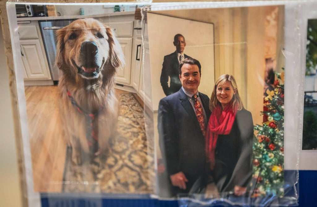 A display at a 2025 memorial service features personal photos of Melissa Hortman, her husband Mark, and their golden retriever, Gilbert. Photo: TNS