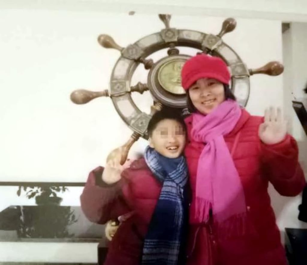 A happy Lele pictured with his adoptive mother when he was a young boy. Photo: Jimu News A happy Lele pictured with his adoptive mother when he was a young boy. Photo: Jimu News