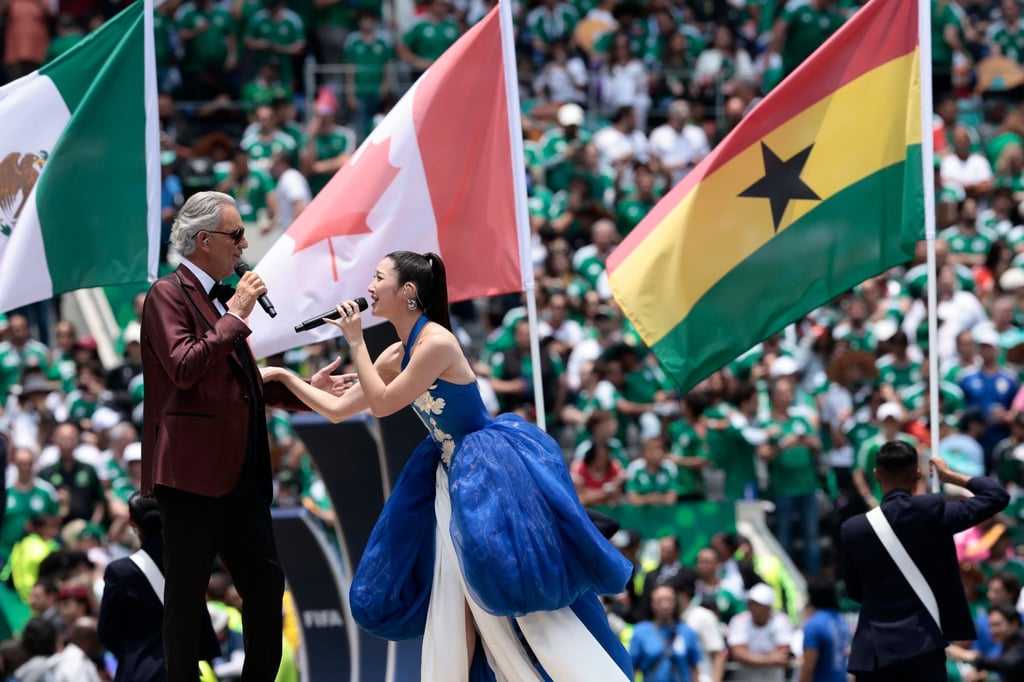 Italian tenor Andrea Bocelli (left) and South Korean singer Ejae perform during the opening ceremony. Photo: EPA Italian tenor Andrea Bocelli (left) and South Korean singer Ejae perform during the opening ceremony. Photo: EPA