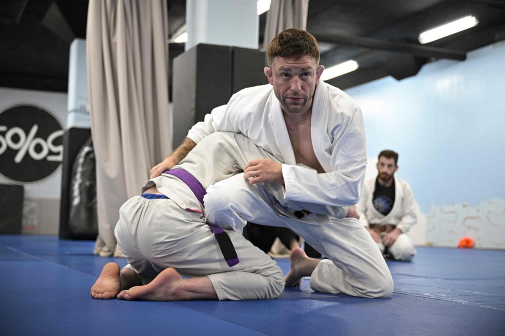 UFC fighter and gym owner Ryan Hall says violence is “part of the magic”. Photo: AFP UFC fighter and gym owner Ryan Hall says violence is “part of the magic”. Photo: AFP