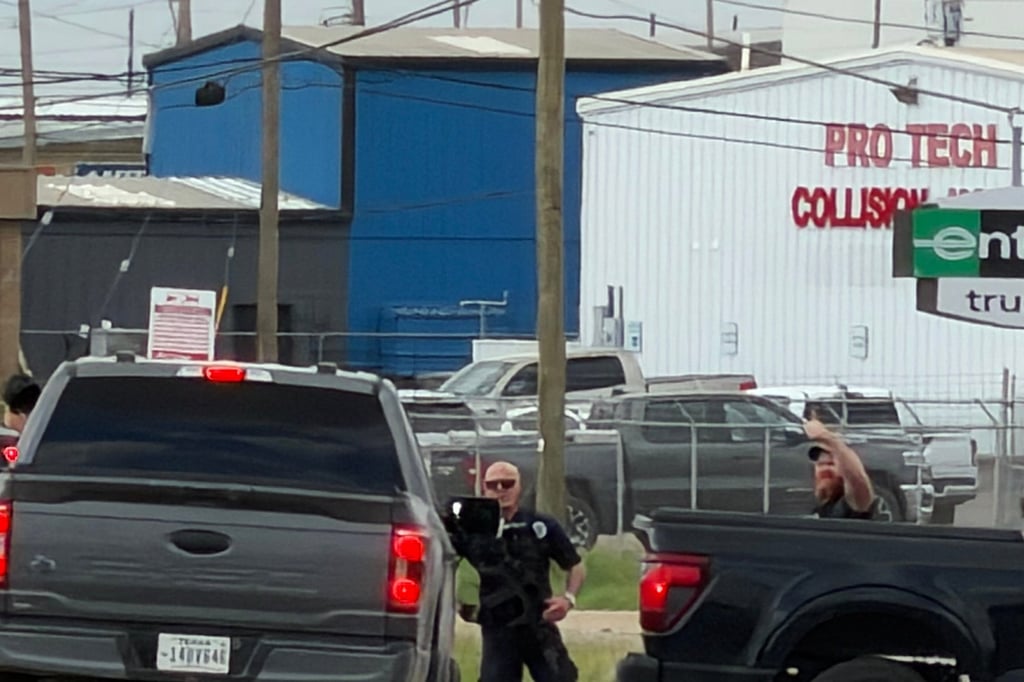 Law enforcement officers respond to a shooting in Midland, Texas, on Friday. Photo: Reporter-Telegram via AP Law enforcement officers respond to a shooting in Midland, Texas, on Friday. Photo: Reporter-Telegram via AP