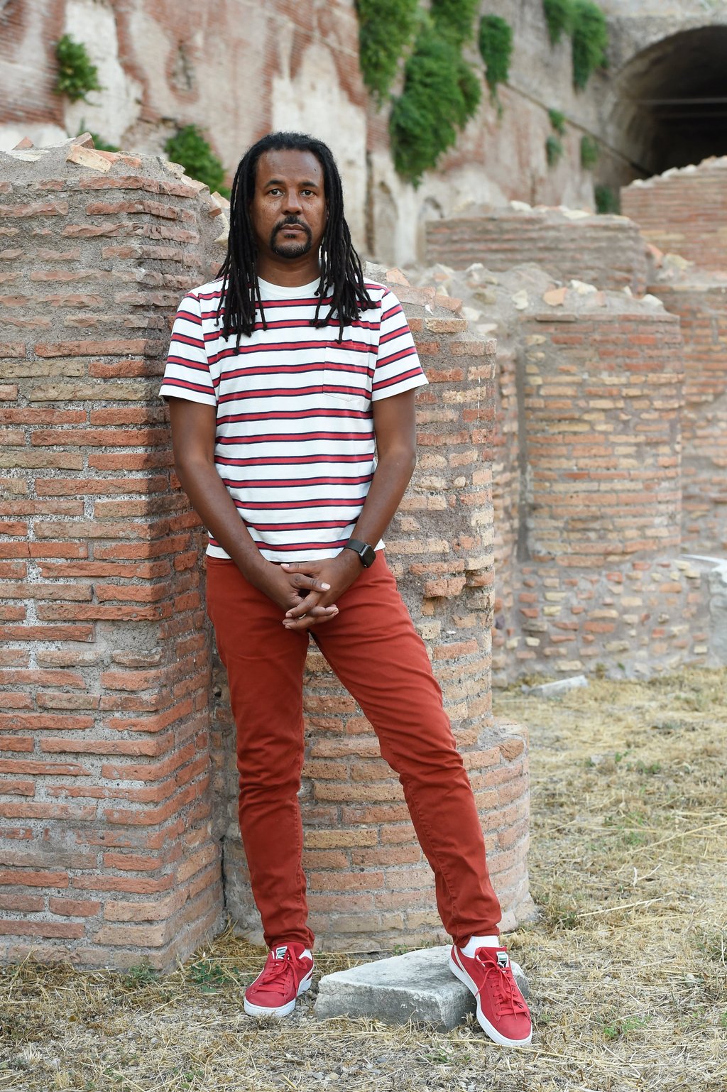 American writer Colson Whitehead wears a striped T and fitted jeans. Photo: Getty Images