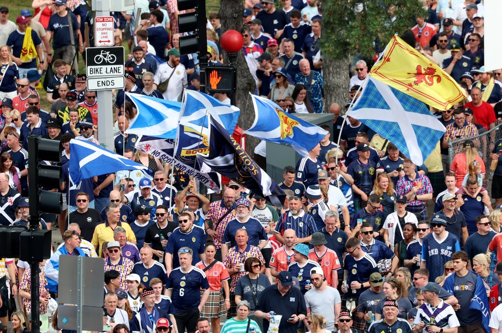Scotland fans make their way to Fenway Park ahead of a baseball game between the Boston Red Sox and the Texas Rangers. Photo: AP Scotland fans make their way to Fenway Park ahead of a baseball game between the Boston Red Sox and the Texas Rangers. Photo: AP