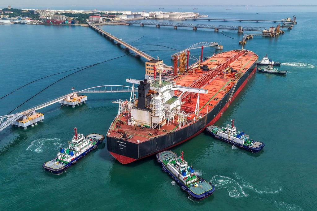Tugboats move a crude oil tanker to its berth in Qingdao, in China’s eastern Shandong province. The US has sanctioned several Chinese independent, or “teapot”, refineries that purchase Iranian crude. Photo: AFP Tugboats move a crude oil tanker to its berth in Qingdao, in China’s eastern Shandong province. The US has sanctioned several Chinese independent, or “teapot”, refineries that purchase Iranian crude. Photo: AFP
