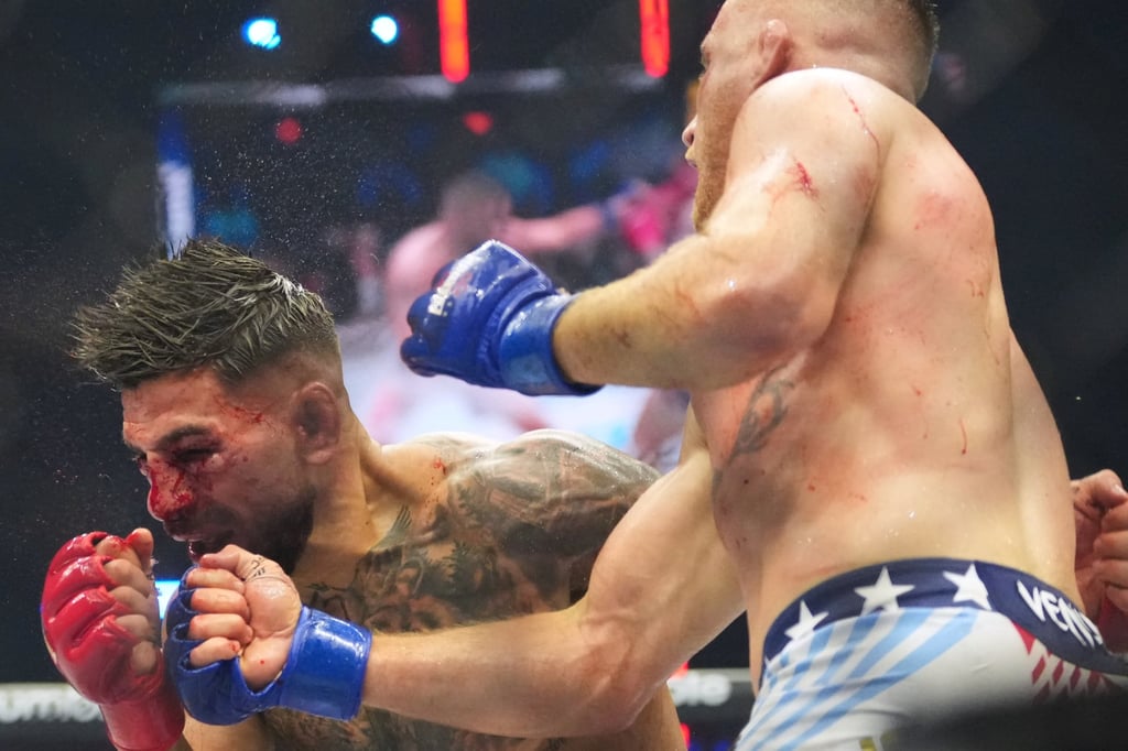 Justin Gaethje (right) hit Ilia Toupruia with a flurry that left his opponent’s face swollen and bloodied. Photo: AP Justin Gaethje (right) hit Ilia Toupruia with a flurry that left his opponent’s face swollen and bloodied. Photo: AP