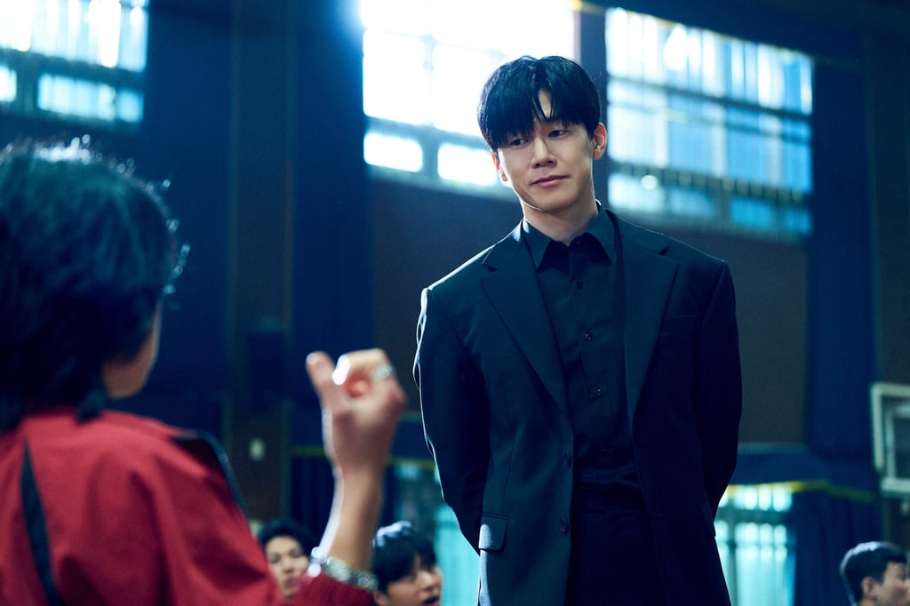 Kim Mu-yeol plays former special forces officer turned school enforcer in “Teach You a Lesson”. Photo: Netflix Kim Mu-yeol plays former special forces officer turned school enforcer in “Teach You a Lesson”. Photo: Netflix