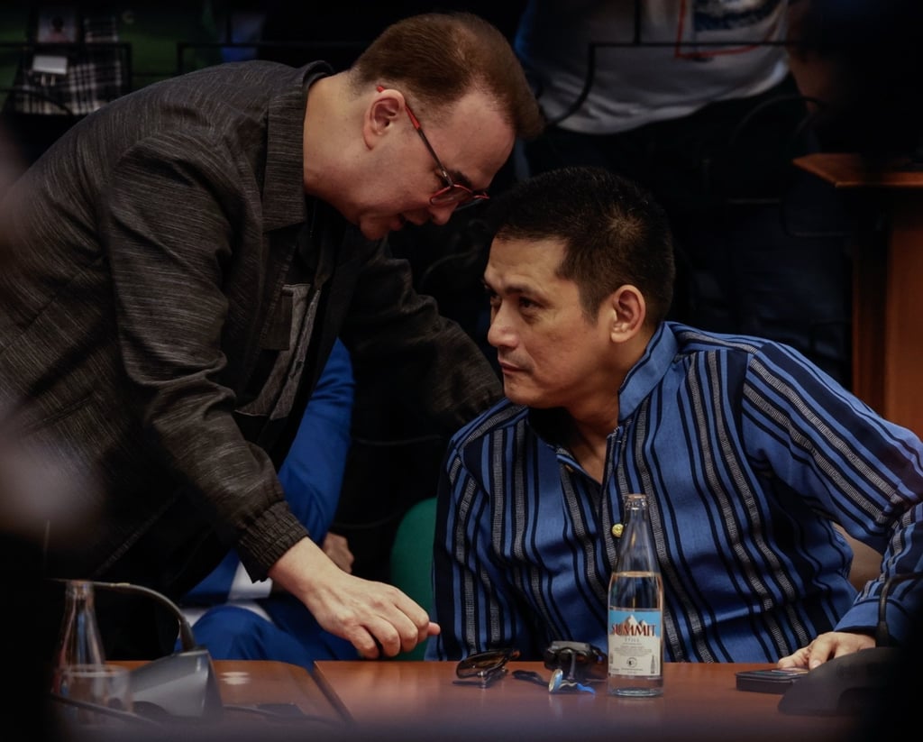 Senators Alan Peter Cayetano (left) and Robin Padilla chat during a Senate committee hearing into anomalous government flood control projects on June 4. Photo: EPA Senators Alan Peter Cayetano (left) and Robin Padilla chat during a Senate committee hearing into anomalous government flood control projects on June 4. Photo: EPA