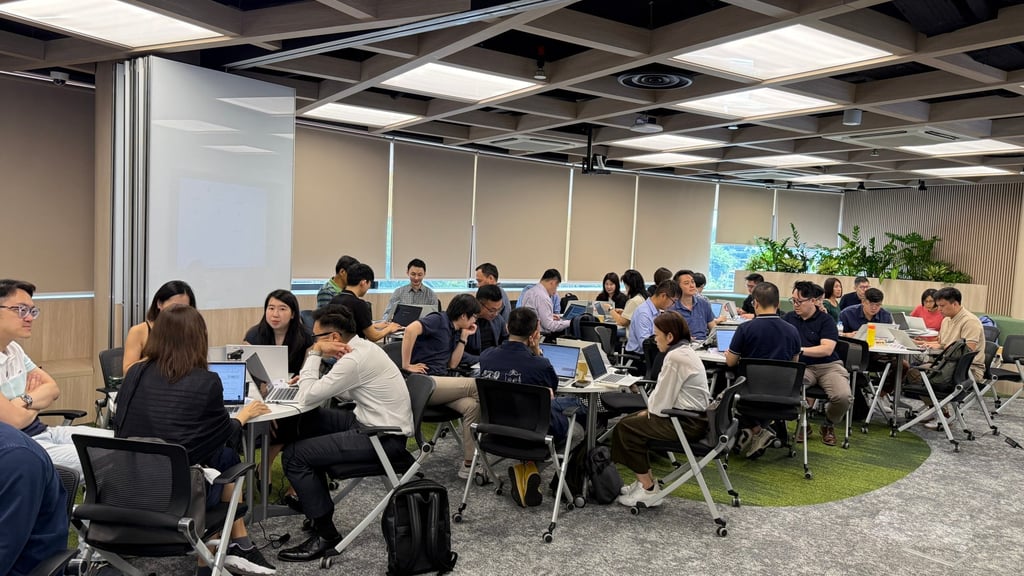 UOB employees take part in a Microsoft 365 Copilot Chat workshop as the bank trains its 32,000 staff to use AI. Photo: UOB
