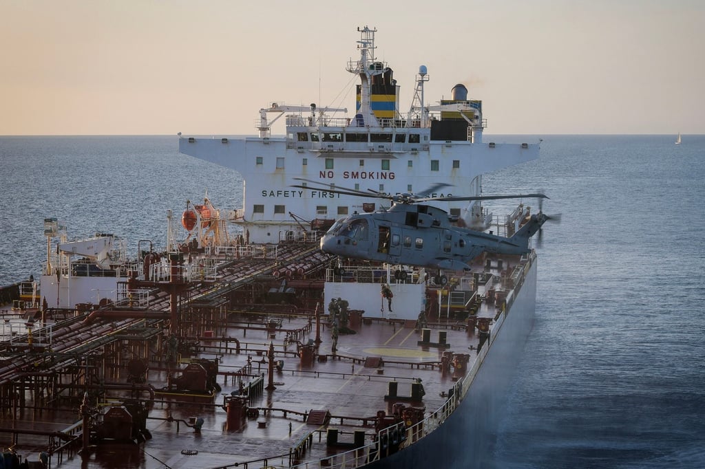 Royal Marine Commandos detain a sanctioned tanker in the English Channel on Sunday. Photo: UK Royal Navy via AP Royal Marine Commandos detain a sanctioned tanker in the English Channel on Sunday. Photo: UK Royal Navy via AP