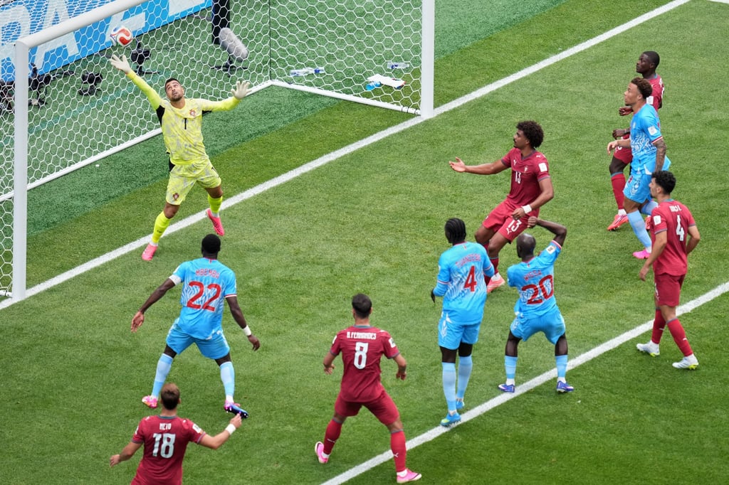 Portugal goalkeeper Diogo Costa fails to stop Yoane Wissa (centre) from heading in an equaliser. Photo: AP Portugal goalkeeper Diogo Costa fails to stop Yoane Wissa (centre) from heading in an equaliser. Photo: AP