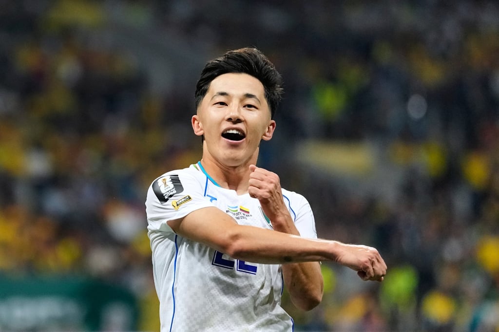 Uzbekistan’s Abbosbek Fayzullaev celebrates scoring his side’s first goal at a World Cup. Photo: AP Uzbekistan’s Abbosbek Fayzullaev celebrates scoring his side’s first goal at a World Cup. Photo: AP