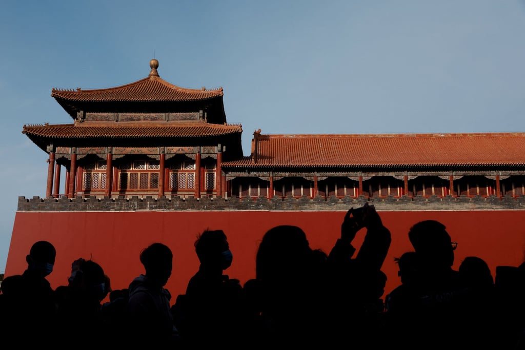 Tourists queue to enter the Forbidden City. Photo: Reuters Tourists queue to enter the Forbidden City. Photo: Reuters