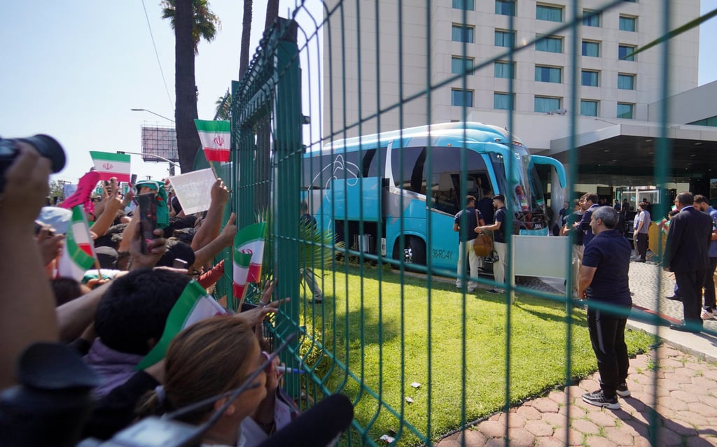 The Iranian team leaving their hotel in Tijuana before the first match against New Zealand. Photo: Reuters