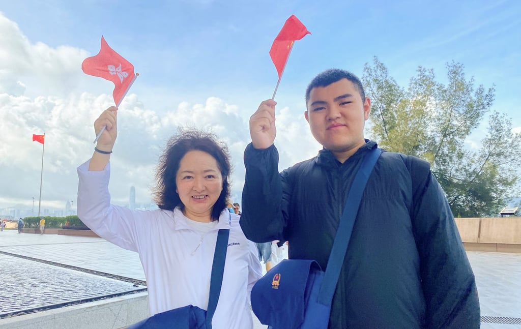 Jennifer Shao Xia and her 16-year-old son Harry Wang Haorui at the Ngong Shuen Chau Barracks on Saturday. Photo: Fiona Sun Jennifer Shao Xia and her 16-year-old son Harry Wang Haorui at the Ngong Shuen Chau Barracks on Saturday. Photo: Fiona Sun