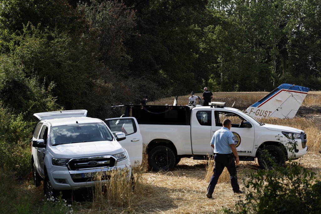 Forensic technicians on Saturday examine the wreckage of the Cessna 421 that crashed the previous day in La Baule, western France. Photo: AP Forensic technicians on Saturday examine the wreckage of the Cessna 421 that crashed the previous day in La Baule, western France. Photo: AP