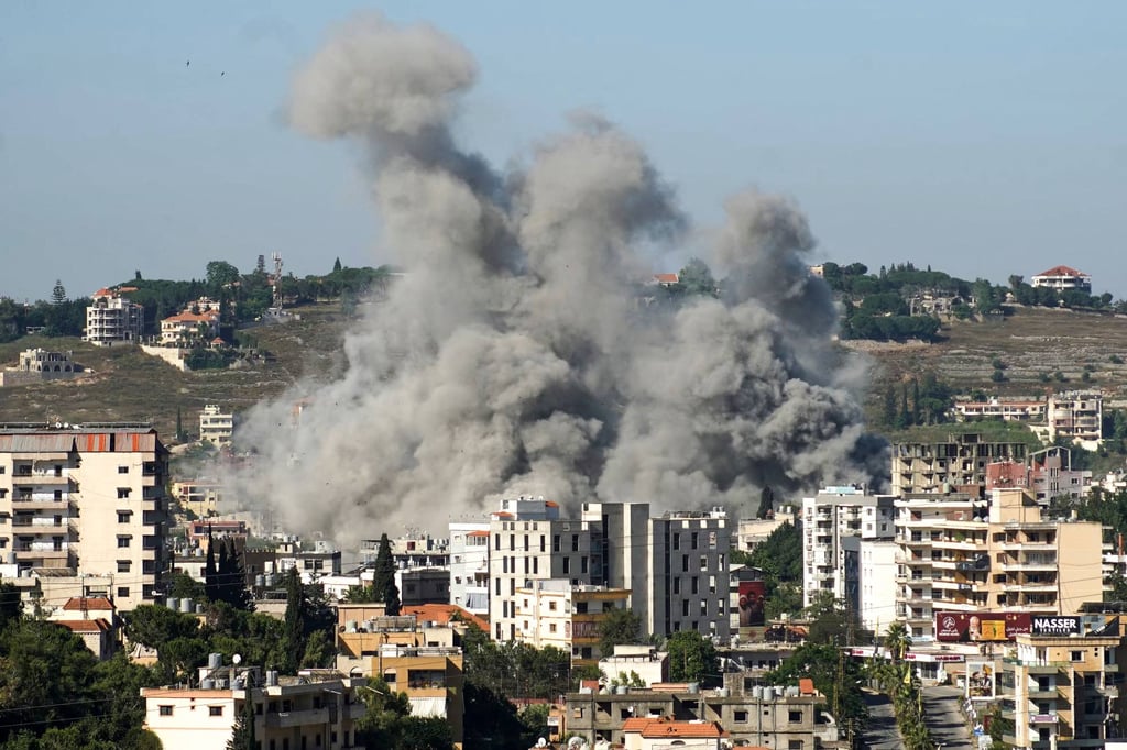 Smoke rises from the site of a string of Israeli air strikes that targeted the southern Lebanese city of Nabatieh on Saturday, despite a new ceasefire between Israel and the Iran-backed Hezbollah group announced a day earlier. Photo: AFP Smoke rises from the site of a string of Israeli air strikes that targeted the southern Lebanese city of Nabatieh on Saturday, despite a new ceasefire between Israel and the Iran-backed Hezbollah group announced a day earlier. Photo: AFP