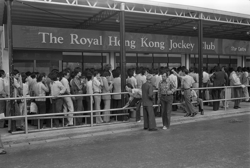 Wannabe millionaires queue up to buy Mark Six lottery tickets at a Jockey Club betting centre in 1979. Photo: SCMP Archives