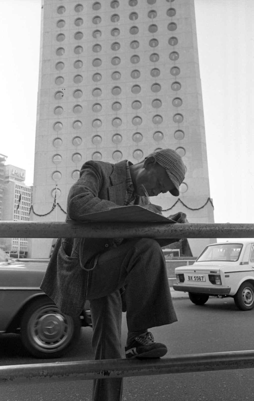 A man fills in Mark Six tickets in Central, in 1980. Photo: SCMP Archives