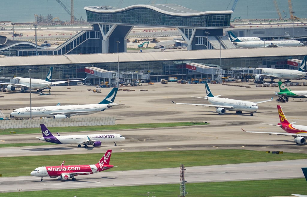 AirAsia, Cathay Pacific and HK Express aircraft line the taxiways of Hong Kong International Airport in July 2024. Photo: May Tse