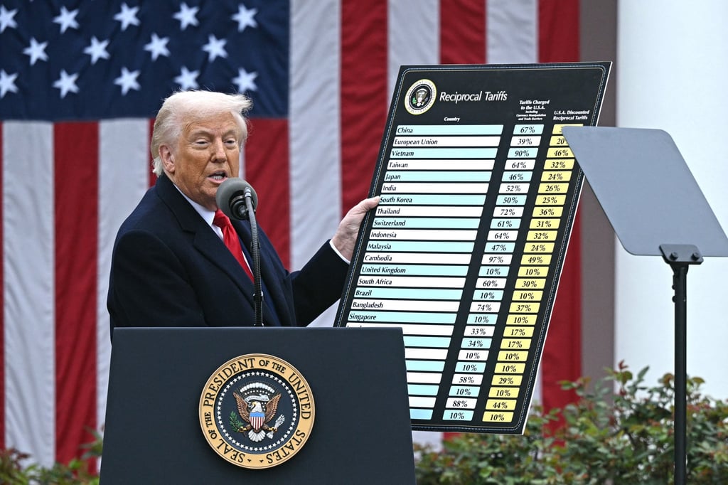 US President Donald Trump holds a chart as he delivers remarks on reciprocal tariffs at the White House in Washington, DC, on April 2, 2025. Photo: AFP/Getty Images/TNS US President Donald Trump holds a chart as he delivers remarks on reciprocal tariffs at the White House in Washington, DC, on April 2, 2025. Photo: AFP/Getty Images/TNS