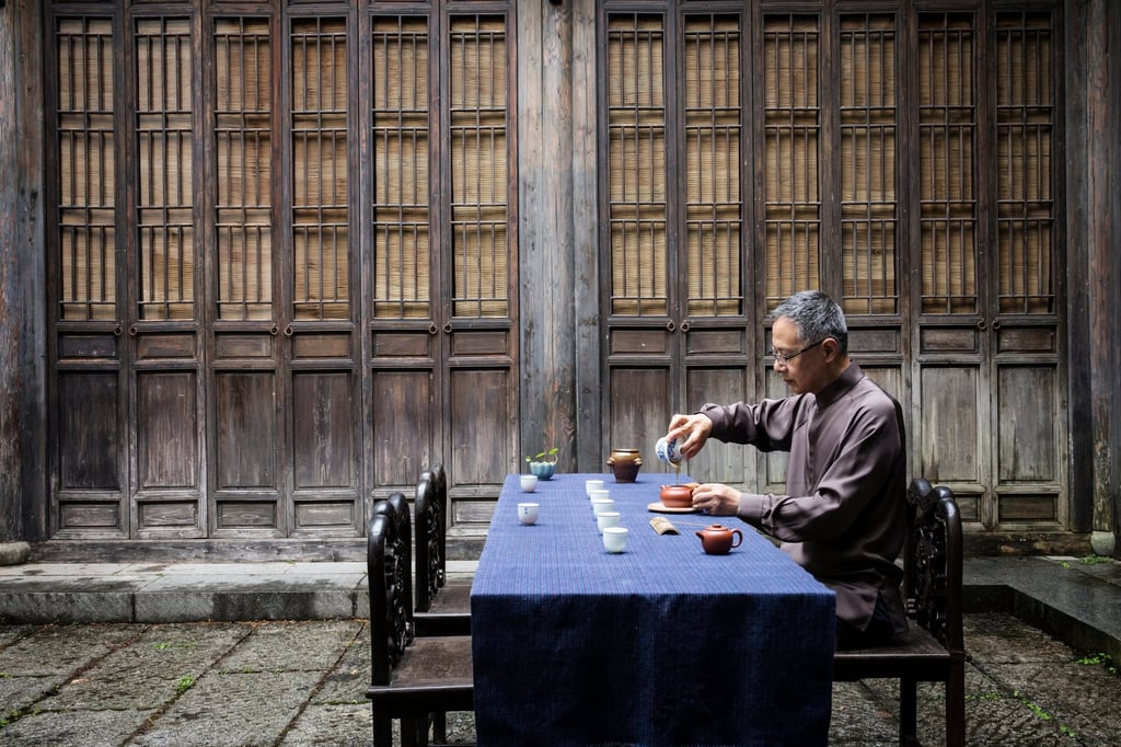 A tea master performs a traditional gongfu tea ceremony at Fayun Place, Amanfayun’s historic teahouse. Photo: Handout