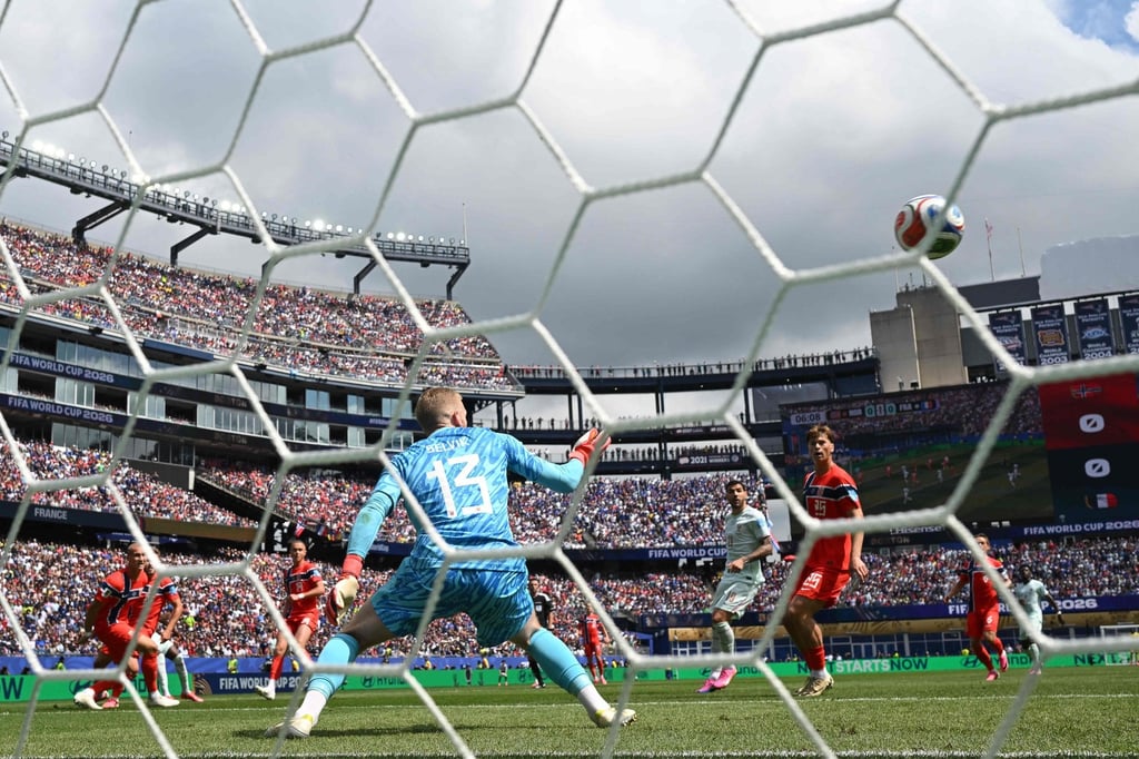 Norwegian goalkeeper Egil Selvik can do little to stop any of Ousmane Dembele's goals. Photo: AFP