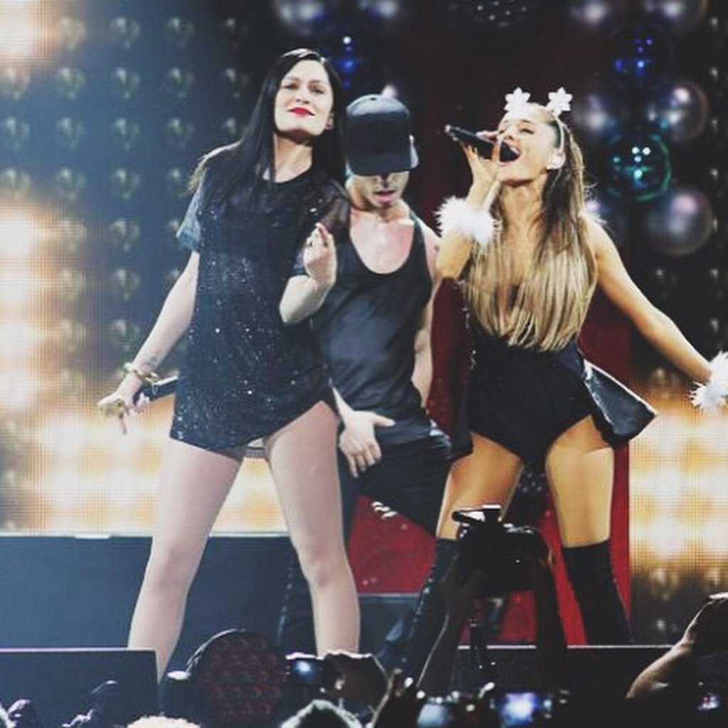 Ricky Alvarez (centre) as a backup dancer for Ariana Grande in 2014. Photo: @rickyrozay/Instagram