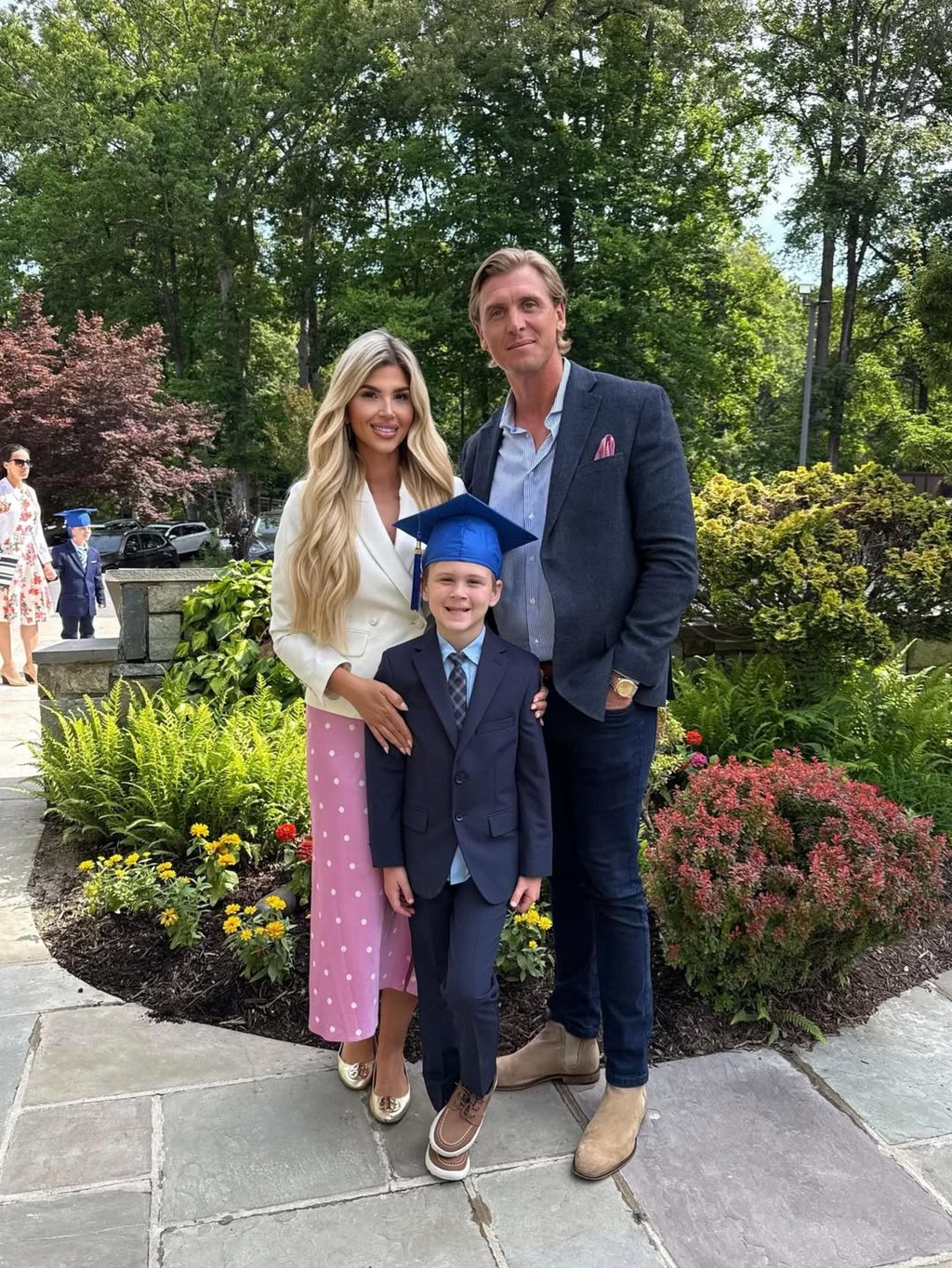 Adrienne Gray and her husband John at their son Charlie’s kindergarten graduation earlier this month. Photo: @adriennegraytv/Instagram