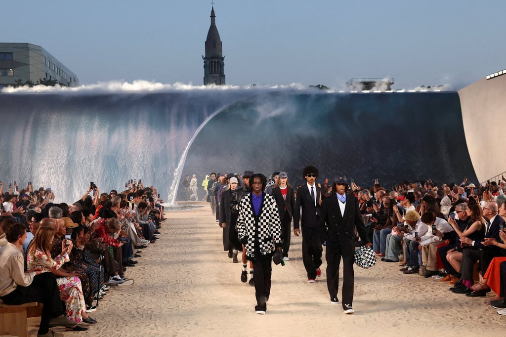 Models walk in Pharrell Williams’ Louis Vuitton menswear spring/summer 2027 show in Paris in June – a spectacle of legacy branding at a time when luxury clients are increasingly seeking emotional connection over logo recognition. Photo: Reuters