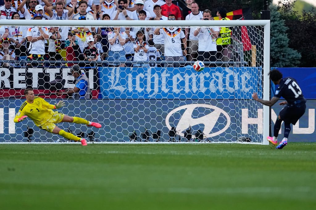 Jose Canale of Paraguay scores a penalty kick. Photo: AP