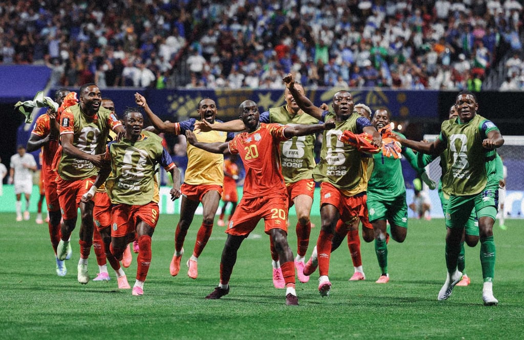Yoane Wissa (20) leads his DR Congo teammates in celebration after scoring their third goal against Uzbekistan on Saturday. Photo: AFP Yoane Wissa (20) leads his DR Congo teammates in celebration after scoring their third goal against Uzbekistan on Saturday. Photo: AFP